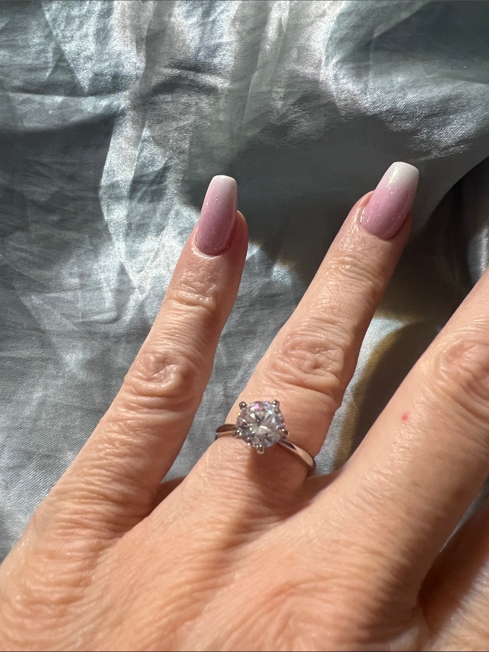 Round-Cut White Crystal Solitaire Ring in Silver Tone